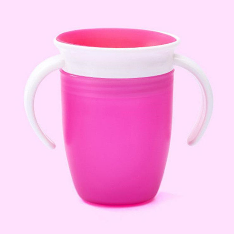 Pink cup with white handle on a pink background