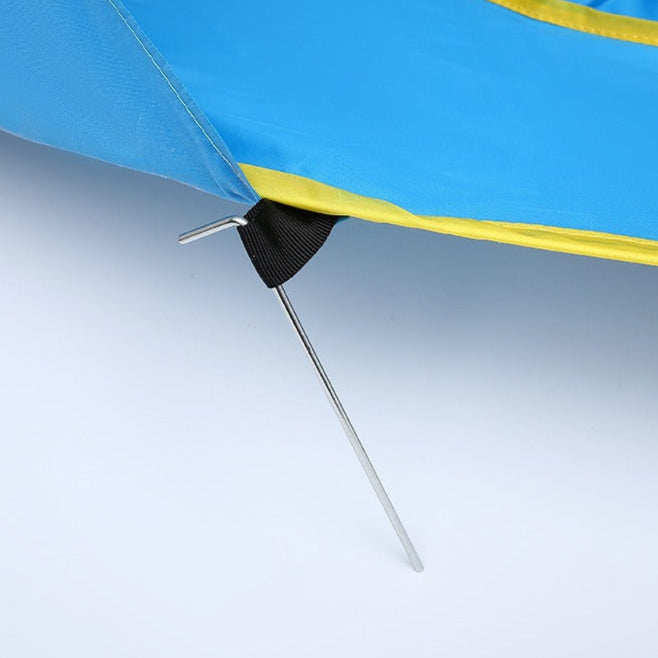 baby tent stake with blue and yellow fabric background